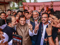 Winning candidates Javid Hassan Baig, Javid Ahmad Dar, Irshad Rasool Kar, and Sajad Shafi from the National Conference speak to the media ou...