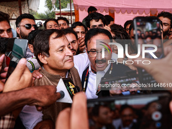 Sajad Shafi, the National Conference winning candidate from Audi, speaks to the media outside the counting center during assembly election r...