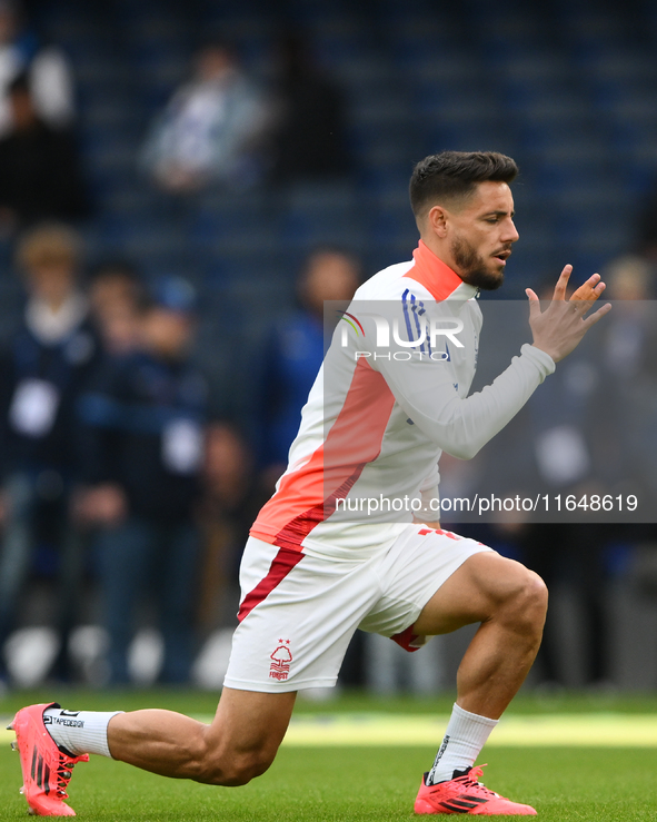 Alex Moreno of Nottingham Forest warms up ahead of kick-off during the Premier League match between Chelsea and Nottingham Forest at Stamfor...