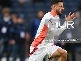 Alex Moreno of Nottingham Forest warms up ahead of kick-off during the Premier League match between Chelsea and Nottingham Forest at Stamfor...