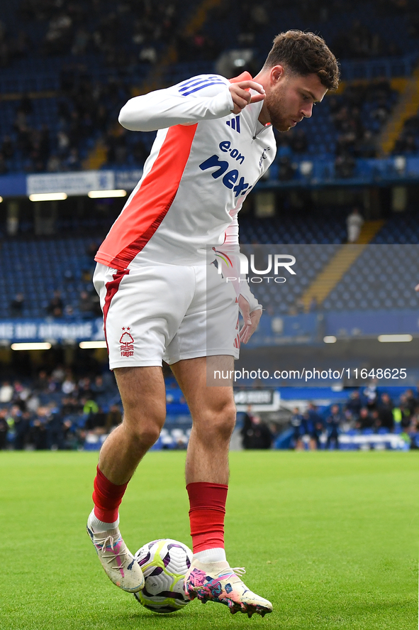 Neco Williams of Nottingham Forest warms up ahead of kick-off during the Premier League match between Chelsea and Nottingham Forest at Stamf...