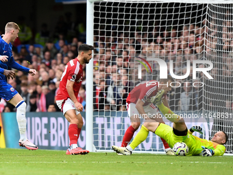 Matz Sels, the Nottingham Forest goalkeeper, saves the ball with James Ward-Prowse and Alex Moreno of Nottingham Forest supporting as Cole P...