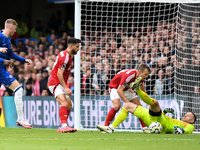 Matz Sels, the Nottingham Forest goalkeeper, saves the ball with James Ward-Prowse and Alex Moreno of Nottingham Forest supporting as Cole P...