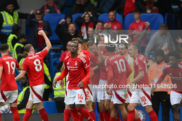 The Reds celebrate after Chris Wood of Nottingham Forest scores a goal to make it 0-1 during the Premier League match between Chelsea and No...