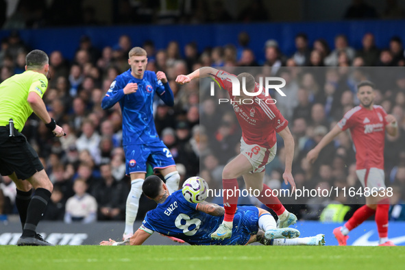 Elliott Anderson of Nottingham Forest battles with Enzo Fernandez of Chelsea during the Premier League match between Chelsea and Nottingham...