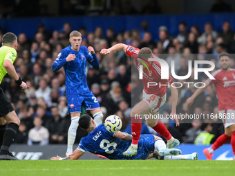 Elliott Anderson of Nottingham Forest battles with Enzo Fernandez of Chelsea during the Premier League match between Chelsea and Nottingham...