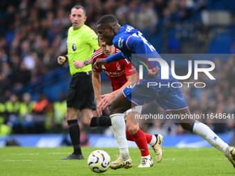 James Ward-Prowse of Nottingham Forest puts pressure on Nicolas Jackson of Chelsea during the Premier League match between Chelsea and Notti...