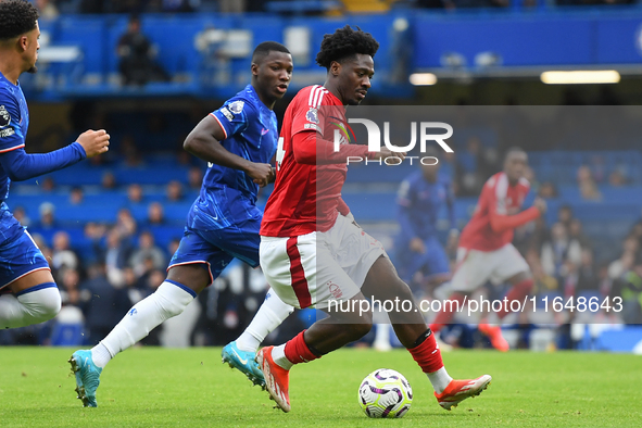 Ola Aina of Nottingham Forest is in action during the Premier League match between Chelsea and Nottingham Forest at Stamford Bridge in Londo...