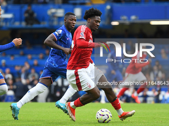 Ola Aina of Nottingham Forest is in action during the Premier League match between Chelsea and Nottingham Forest at Stamford Bridge in Londo...