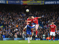 Nikola Milenkovic of Nottingham Forest and James Ward-Prowse of Nottingham Forest battle with Nicolas Jackson of Chelsea during the Premier...