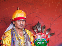 A Nepalese Hindu devotee impersonates a deity, wearing traditional deity clothes and ornaments for the celebration of the Shikali Jatra Fest...