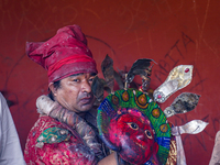 A Nepalese Hindu devotee impersonates a deity, wearing traditional deity clothes and ornaments for the celebration of the Shikali Jatra Fest...