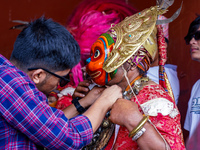 A Nepalese Hindu devotee impersonates a deity, wearing traditional deity clothes and ornaments for the celebration of the Shikali Jatra Fest...