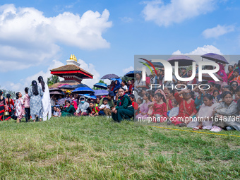 Nepalese Hindu devotees dress as deities and perform a traditional ritual dance during the Sikali Jatra festival in Khokana village, Lalitpu...