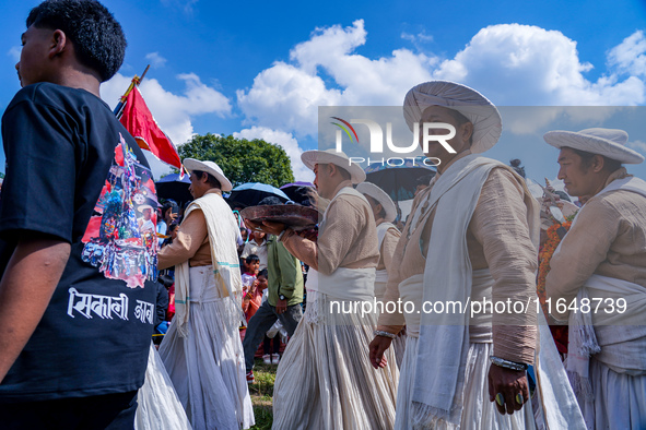 Nepalese Hindu devotees dress as deities and perform a traditional ritual dance during the Sikali Jatra festival in Khokana village, Lalitpu...