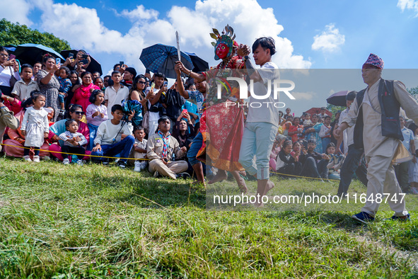 Nepalese Hindu devotees dress as deities and perform a traditional ritual dance during the Sikali Jatra festival in Khokana village, Lalitpu...