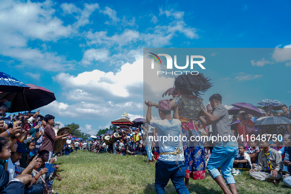 Nepalese Hindu devotees dress as deities and perform a traditional ritual dance during the Sikali Jatra festival in Khokana village, Lalitpu...