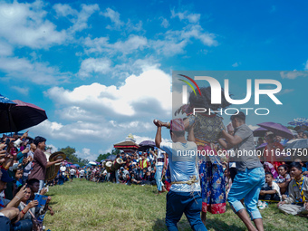 Nepalese Hindu devotees dress as deities and perform a traditional ritual dance during the Sikali Jatra festival in Khokana village, Lalitpu...