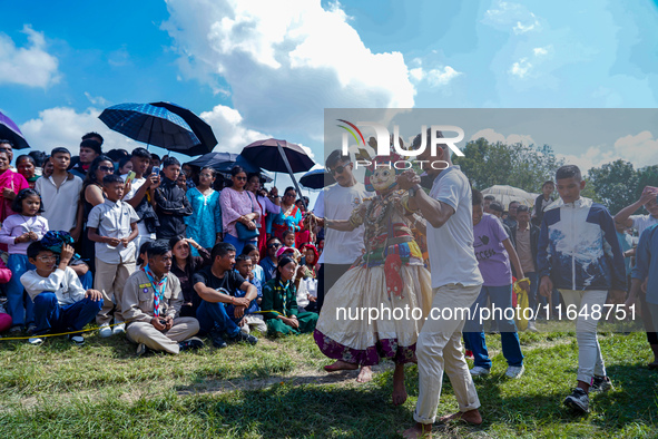 Nepalese Hindu devotees dress as deities and perform a traditional ritual dance during the Sikali Jatra festival in Khokana village, Lalitpu...