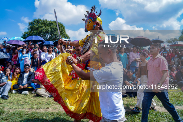 Nepalese Hindu devotees dress as deities and perform a traditional ritual dance during the Sikali Jatra festival in Khokana village, Lalitpu...