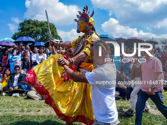 Nepalese Hindu devotees dress as deities and perform a traditional ritual dance during the Sikali Jatra festival in Khokana village, Lalitpu...