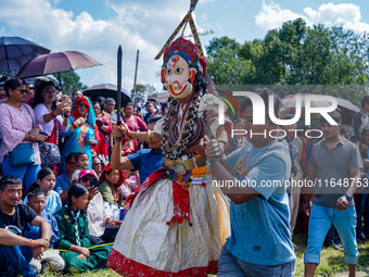 Nepalese Hindu devotees dress as deities and perform a traditional ritual dance during the Sikali Jatra festival in Khokana village, Lalitpu...