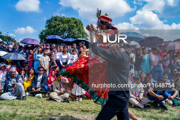 Nepalese Hindu devotees dress as deities and perform a traditional ritual dance during the Sikali Jatra festival in Khokana village, Lalitpu...