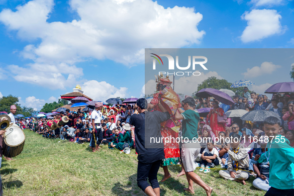 Nepalese Hindu devotees dress as deities and perform a traditional ritual dance during the Sikali Jatra festival in Khokana village, Lalitpu...