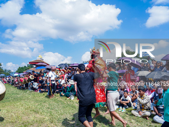 Nepalese Hindu devotees dress as deities and perform a traditional ritual dance during the Sikali Jatra festival in Khokana village, Lalitpu...