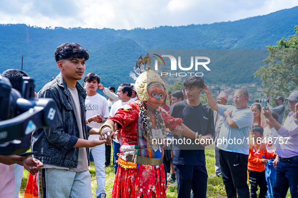 Nepalese Hindu devotees dress as deities and perform a traditional ritual dance during the Sikali Jatra festival in Khokana village, Lalitpu...