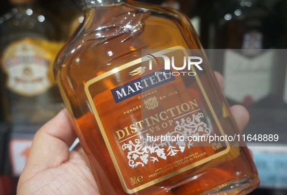 A photo taken on October 8, 2024, shows Martell cognac from France at a supermarket in Hangzhou, China. On the same day, the Ministry of Com...