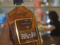 A photo taken on October 8, 2024, shows Martell cognac from France at a supermarket in Hangzhou, China. On the same day, the Ministry of Com...