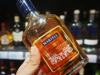 A photo taken on October 8, 2024, shows Martell cognac from France at a supermarket in Hangzhou, China. On the same day, the Ministry of Com...