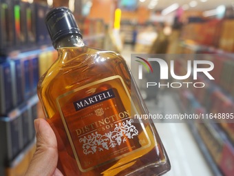 A photo taken on October 8, 2024, shows Martell cognac from France at a supermarket in Hangzhou, China. On the same day, the Ministry of Com...