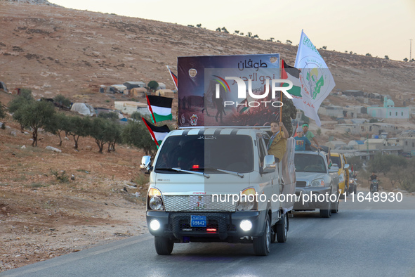 Palestinians in northern Syria commemorate October 7, 2024, by waving Palestinian flags and driving through the streets in their cars. 