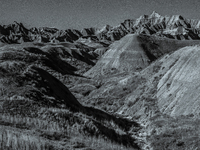 Badlands National Park in South Dakota, USA, contains 242,756 acres of sharply eroded buttes and pinnacles, along with the largest undisturb...