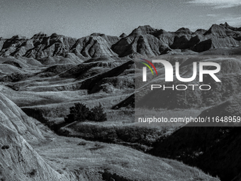 Badlands National Park in South Dakota, USA, contains 242,756 acres of sharply eroded buttes and pinnacles, along with the largest undisturb...