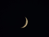 A rising Crescent Moon is seen from Kirtipur, Kathmandu, Nepal, on October 7, 2024. (