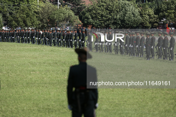 Nepalese army personnel participate in a grand rehearsal for the upcoming Fulpati of the biggest Hindu festival, Dashain Celebration, at Tud...