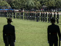 Nepalese army personnel participate in a grand rehearsal for the upcoming Fulpati of the biggest Hindu festival, Dashain Celebration, at Tud...