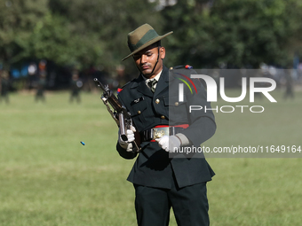 Nepalese army personnel participate in a grand rehearsal for the upcoming Fulpati of the biggest Hindu festival, Dashain Celebration, at Tud...