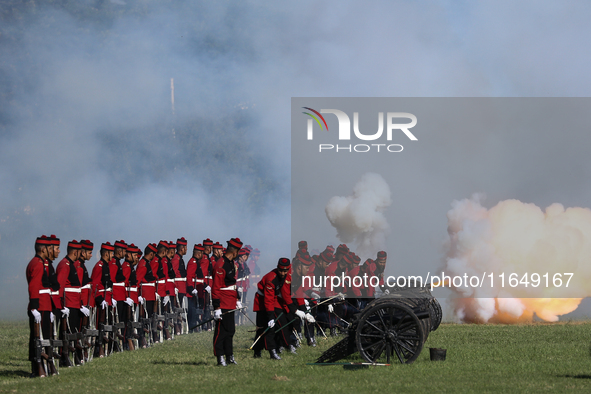 Nepalese army personnel fire cannons during a grand rehearsal for the upcoming Fulpati of the biggest Hindu festival, Dashain Celebration, a...