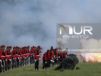 Nepalese army personnel fire cannons during a grand rehearsal for the upcoming Fulpati of the biggest Hindu festival, Dashain Celebration, a...