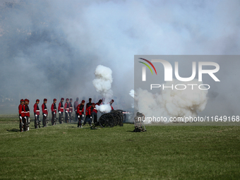 Nepalese army personnel fire cannons during a grand rehearsal for the upcoming Fulpati of the biggest Hindu festival, Dashain Celebration, a...