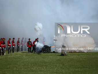 Nepalese army personnel fire cannons during a grand rehearsal for the upcoming Fulpati of the biggest Hindu festival, Dashain Celebration, a...