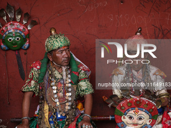 Nepalese devotees impersonate a deity by wearing traditional deity clothes and ornaments for the celebration of the Shikali Festival in Khok...