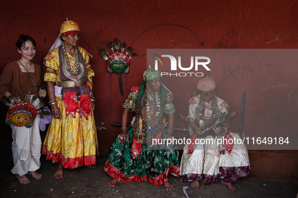 Nepalese devotees impersonate a deity by wearing traditional deity clothes and ornaments for the celebration of the Shikali Festival in Khok...