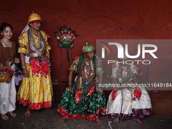 Nepalese devotees impersonate a deity by wearing traditional deity clothes and ornaments for the celebration of the Shikali Festival in Khok...