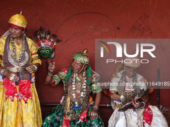 Nepalese devotees impersonate a deity by wearing traditional deity clothes and ornaments for the celebration of the Shikali Festival in Khok...