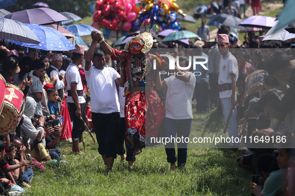 Nepalese devotees impersonate a deity and jump to the tunes of traditional instruments during the celebration of the Shikali Festival in Kho...